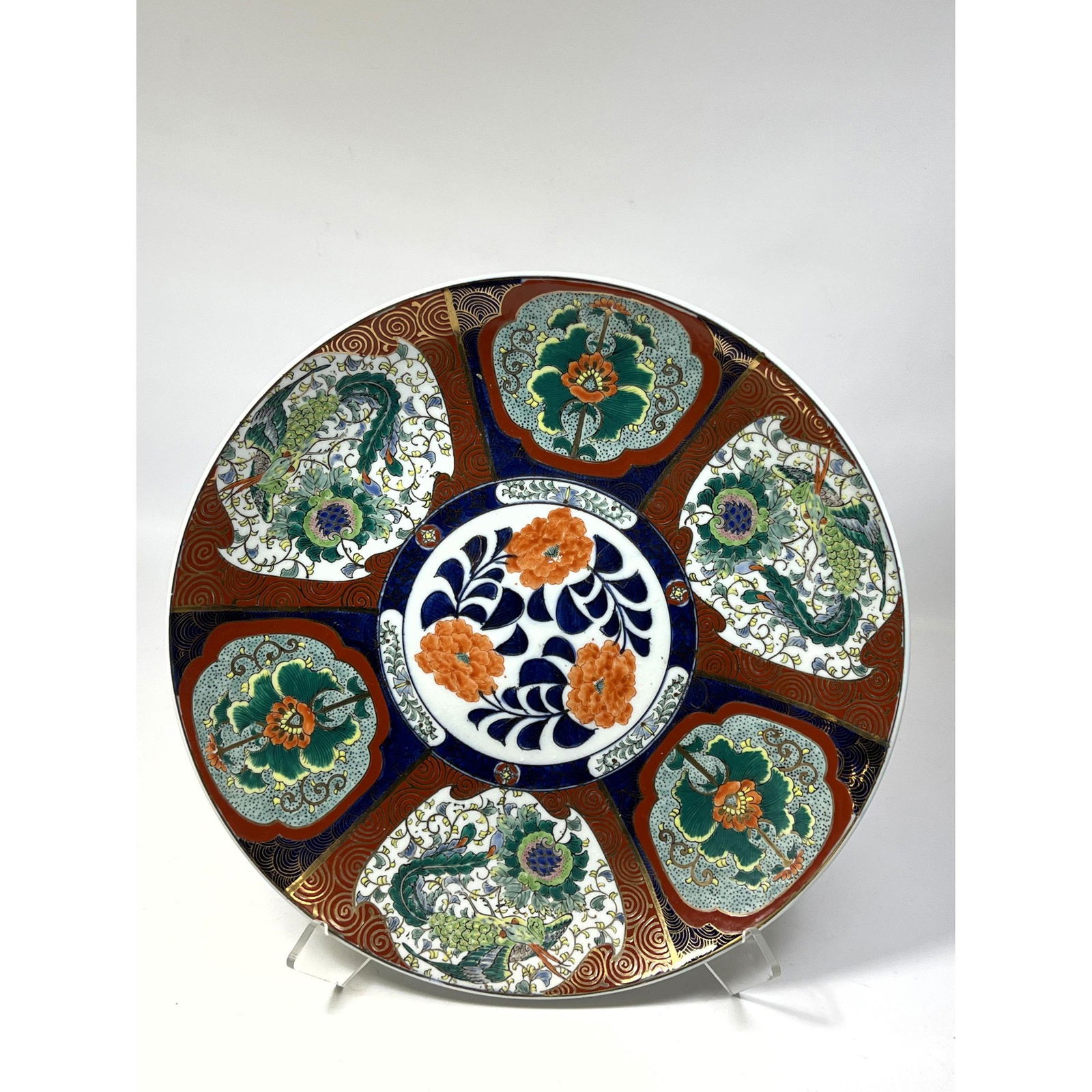 16 inch Chinese porcelain charger with gold decoration. Marked on back with Chinese characters (1 of 10)