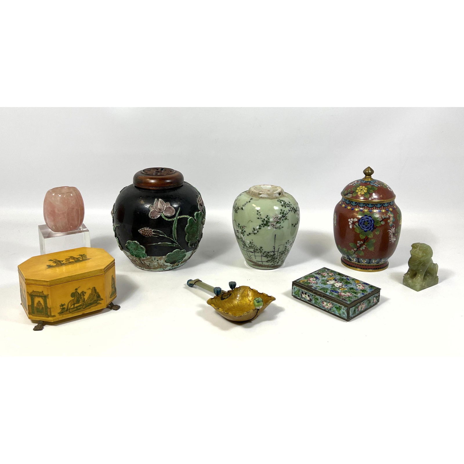 8pc Asian and Chinese Decorative Objects. Carved Rose Quartz Melon Jar. Enamel and Carved Jade Scoop: 8pc Asian and Chinese Decorative Objects. Carved Rose Quartz Melon Jar. Enamel and Carved Jade Scoop. Cloisonne Ginger Jar. Painted Porcelain Ginger Jar. Chinese Enamel Box. Carved Hard Stone Foo Dog.