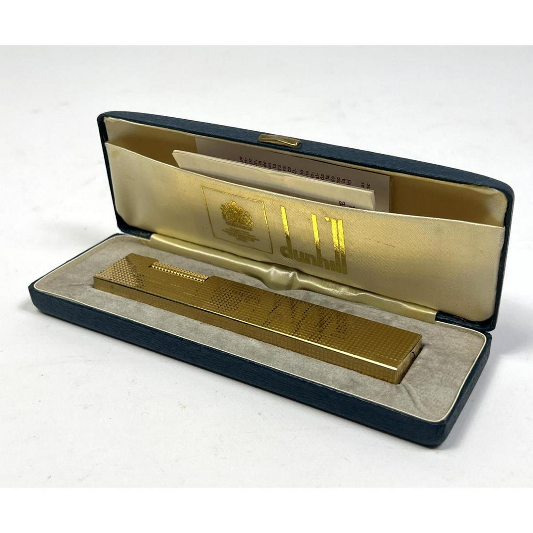 Dunhill gold plated table lighter. Marked made in Switzerland. With original box. Not tested. Needs (1 of 9)