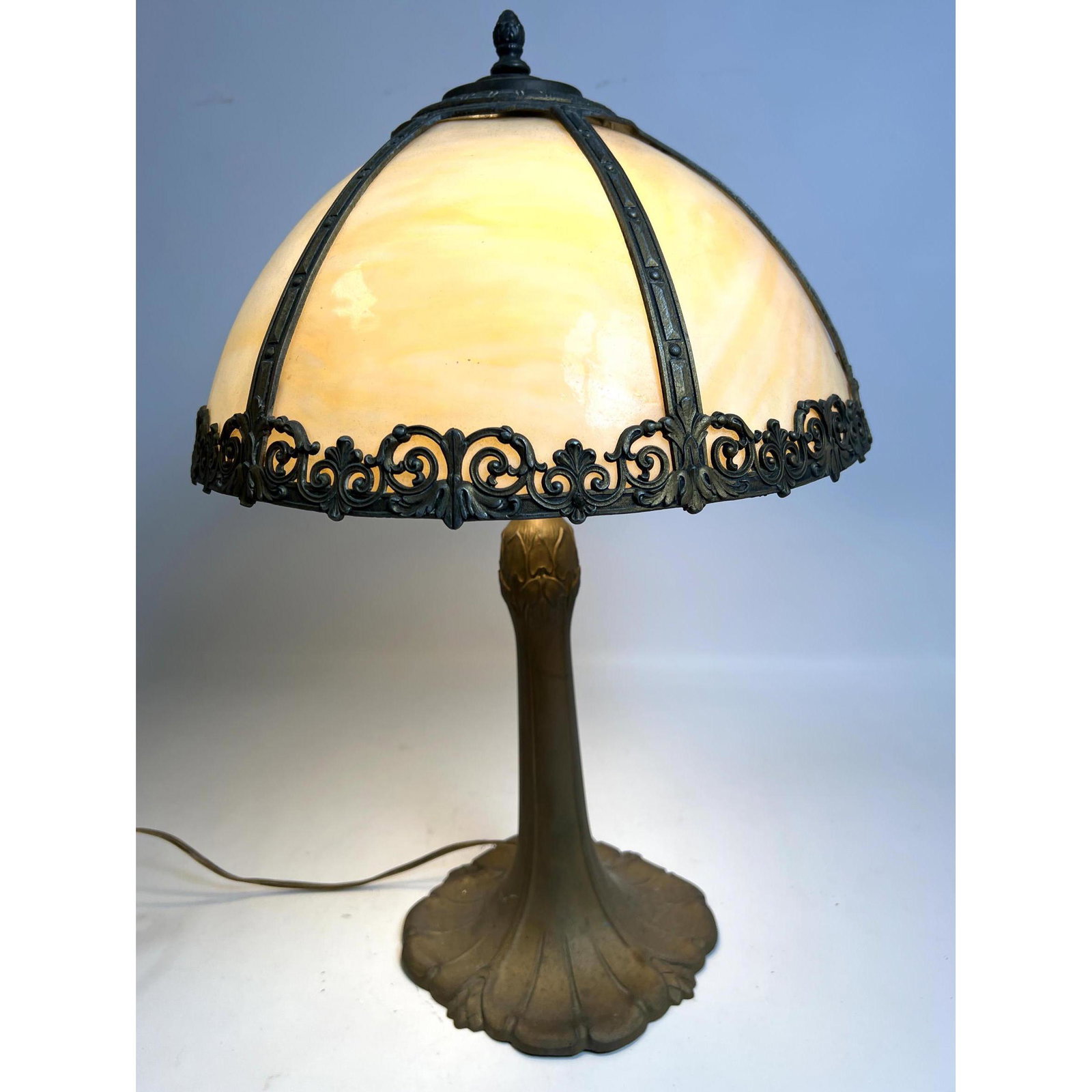 Antique tan slag glass lamp with tree trunk style base.: Antique tan slag glass lamp with tree trunk style base. Dimensions: H: 21 inches: W: 14 inches: D: 14 inches ---