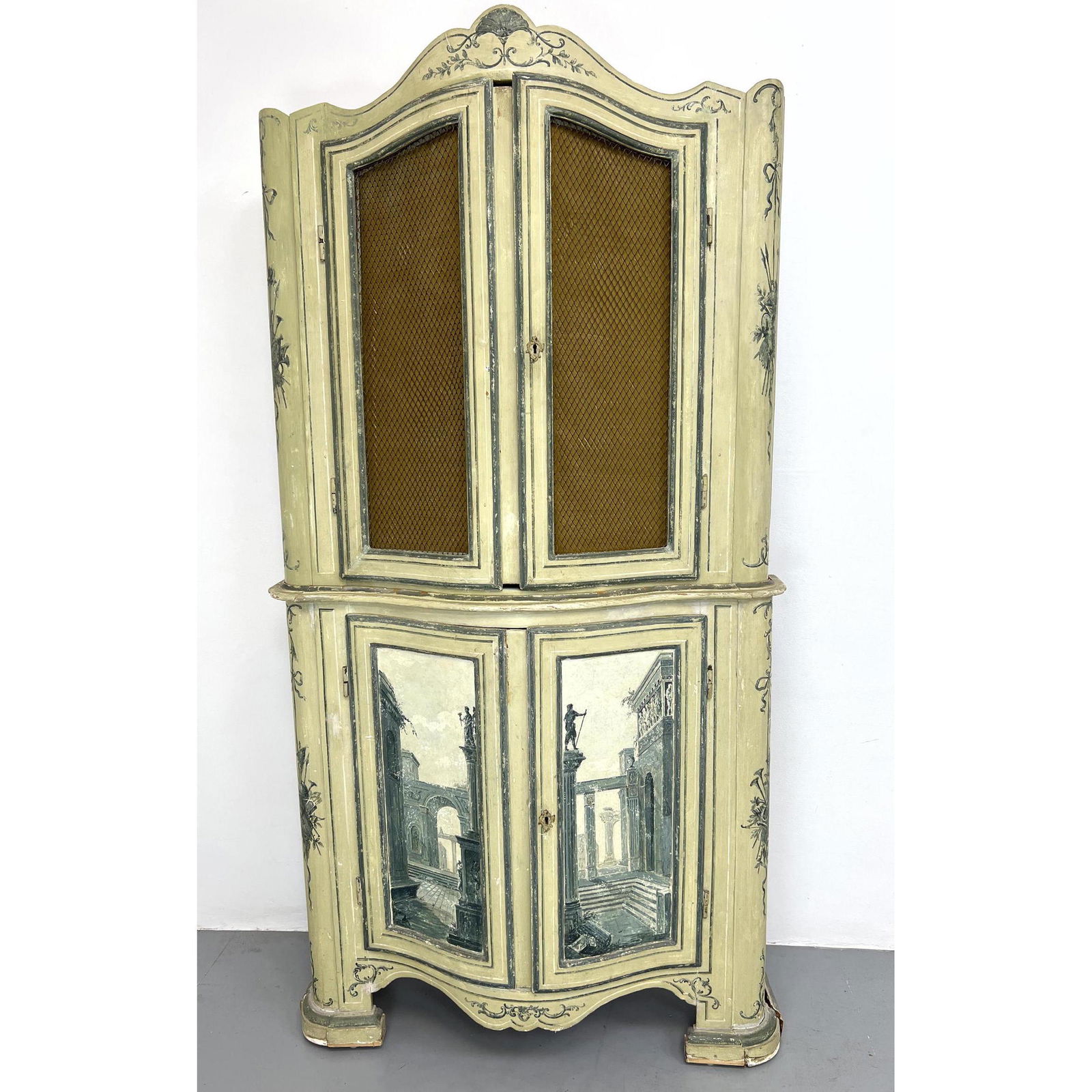Paint decorated 2 part Italian provincial cabinet with mesh doors. Key included. (1 of 16)
