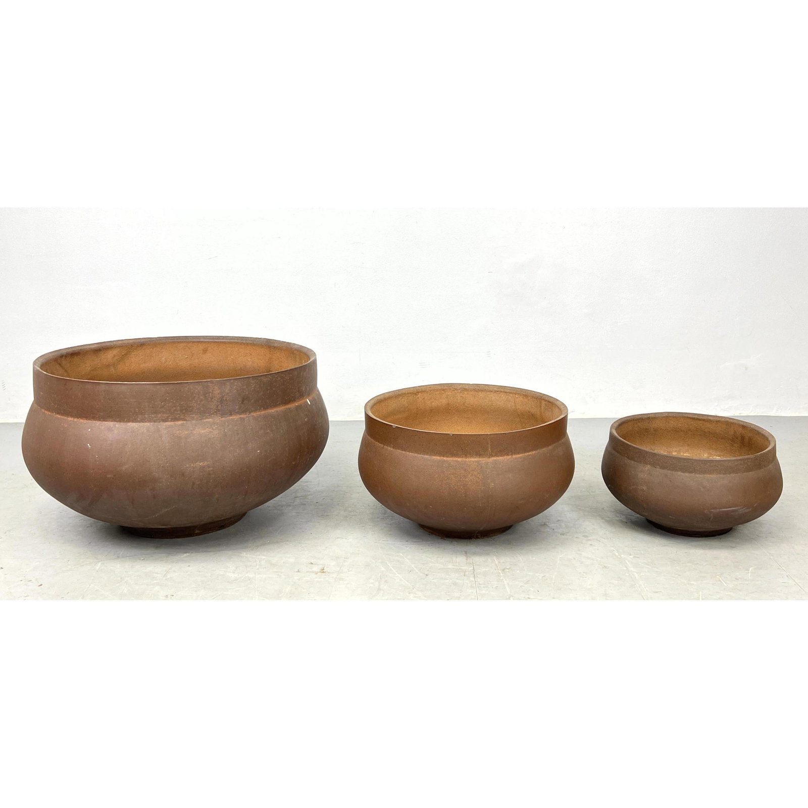 Three monumental architectural terracotta nesting planters. Second size 11 x 20 x 20 smallest 8 x 15 (1 of 9)