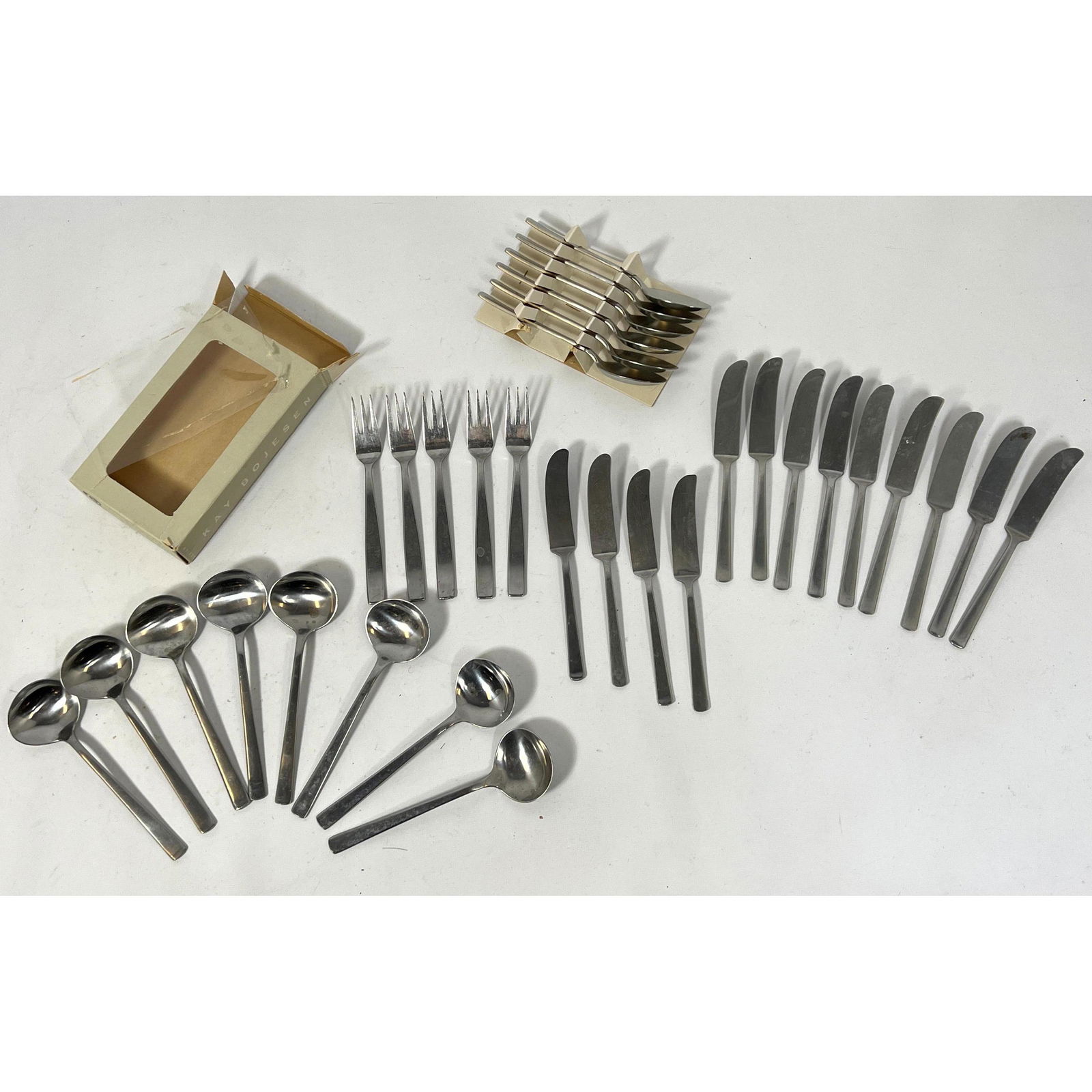 30 pc Kay Bojesen Grand Prix flatware. Including 6 small spoons in original signed box (1 of 9)
