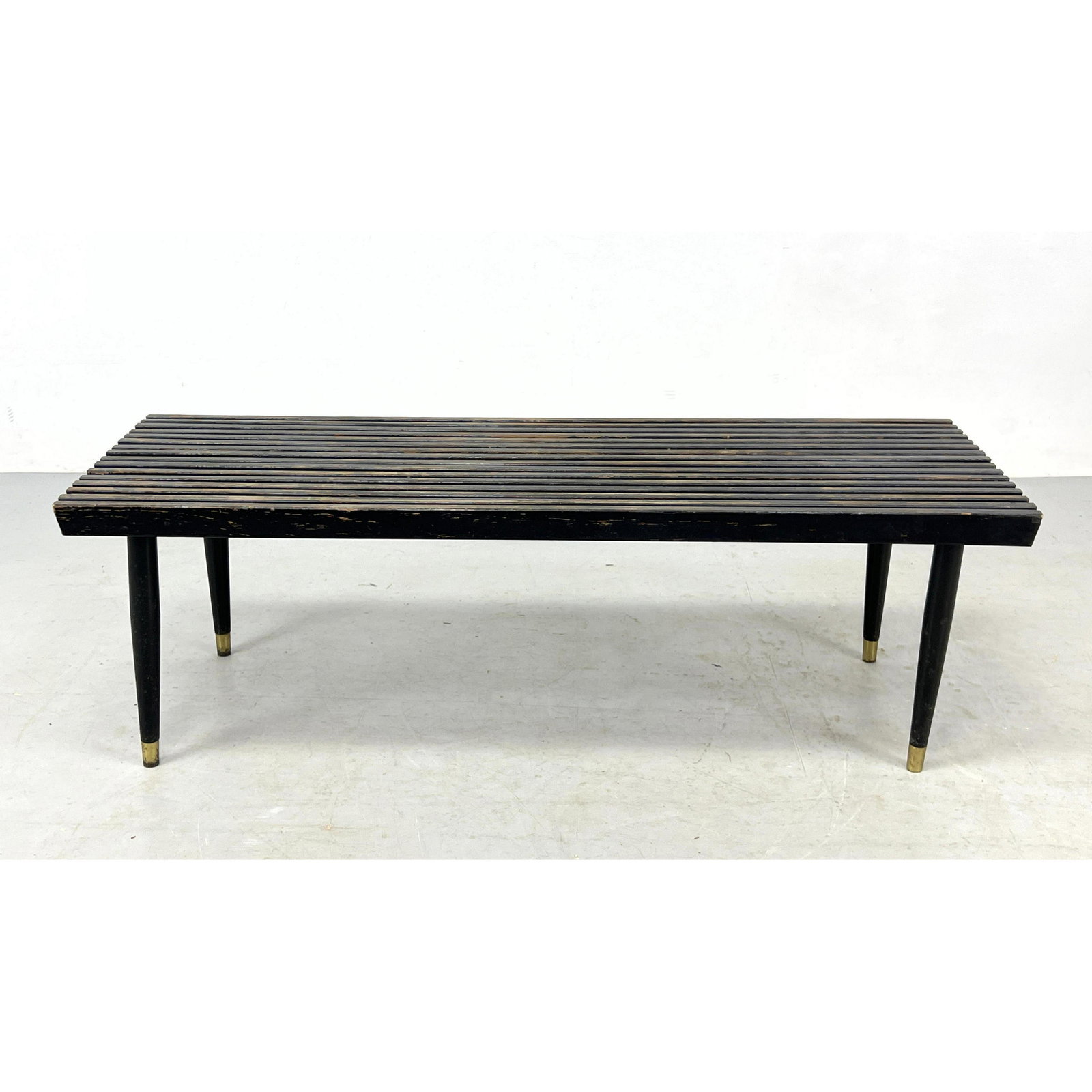 Modernist Ebonized Slat Bench Coffee Table. Peg Legs with brass feet. (1 of 10)