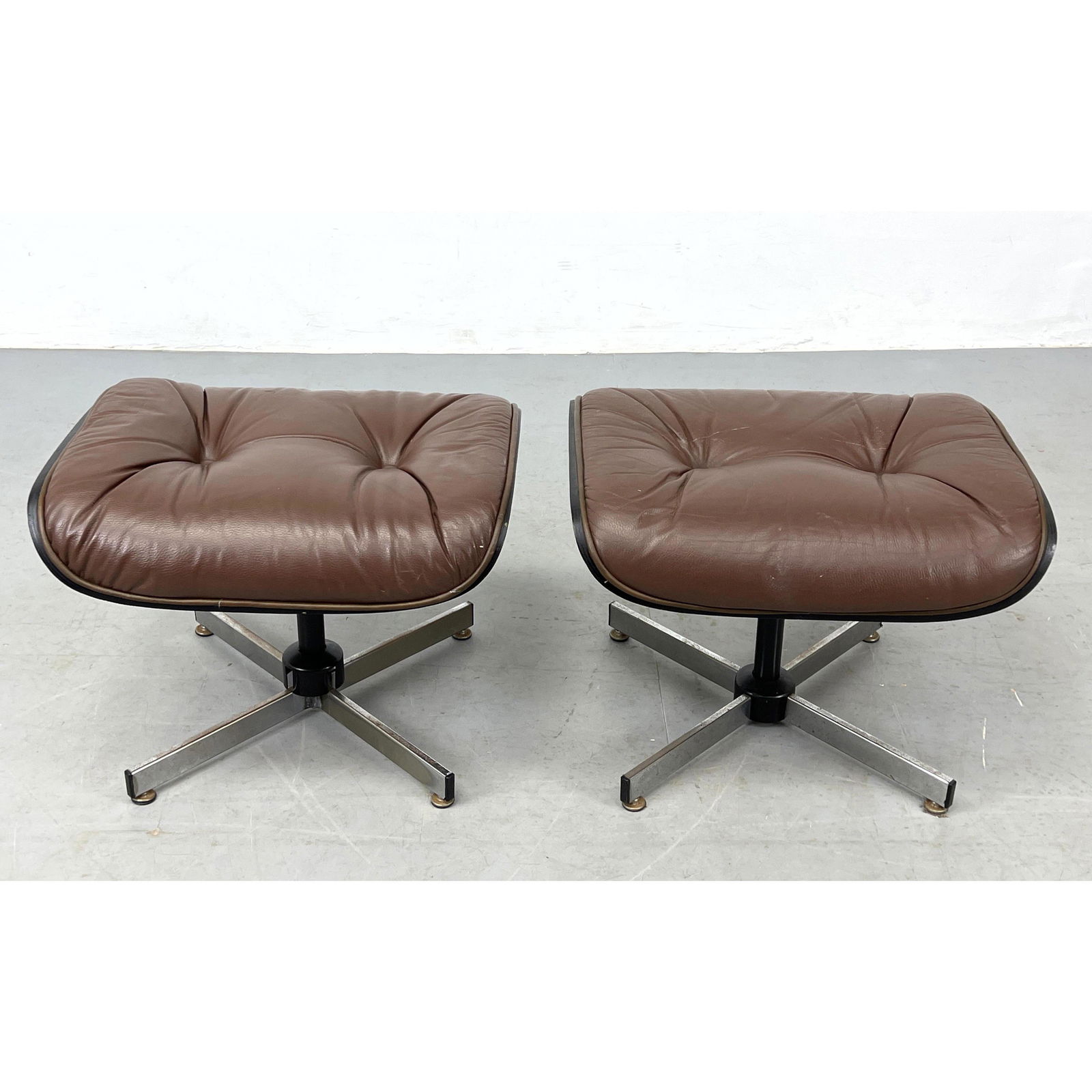 Pr CHARLES EAMES Style Brown Pebble Ottoman. Unsigned. Vinyl.: Pr CHARLES EAMES Style Brown Pebble Ottoman. Unsigned. Vinyl. Dimensions: H: 16 inches: W: 17 inches: D: 21 inches --- Delivery Offer: Uniques offers curbside delivery to NYC, Manhattan, Close Brookly