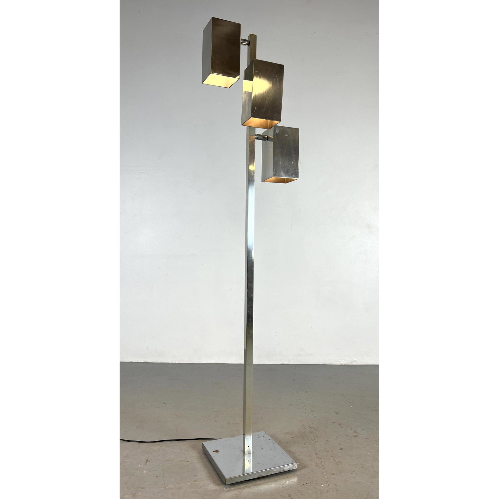 OMI by KOCH and LOWY Chrome Floor Lamp. Three Square Cylinder Shades. Marked OMI.: OMI by KOCH and LOWY Chrome Floor Lamp. Three Square Cylinder Shades. Marked OMI. Dimensions: H: 59 inches: W: 10 inches: D: 10 inches --- Delivery Offer: Uniques offers curbside delivery to NYC, Manh