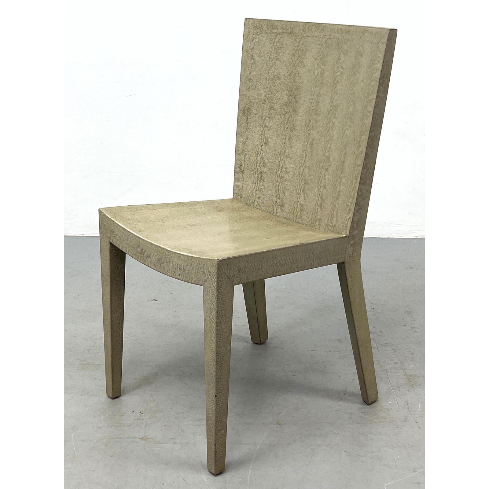 KARL SPRINGER Signed Snakeskin Side Chair. Textured Finish. Signature on label with date; 1984.: KARL SPRINGER Signed Snakeskin Side Chair. Textured Finish. Signature on label with date; 1984. Dimensions: H: 35 inches: W: 17.5 inches: D: 20 inches - Seat Height: 18 inches --- Delivery Offer: Uniq