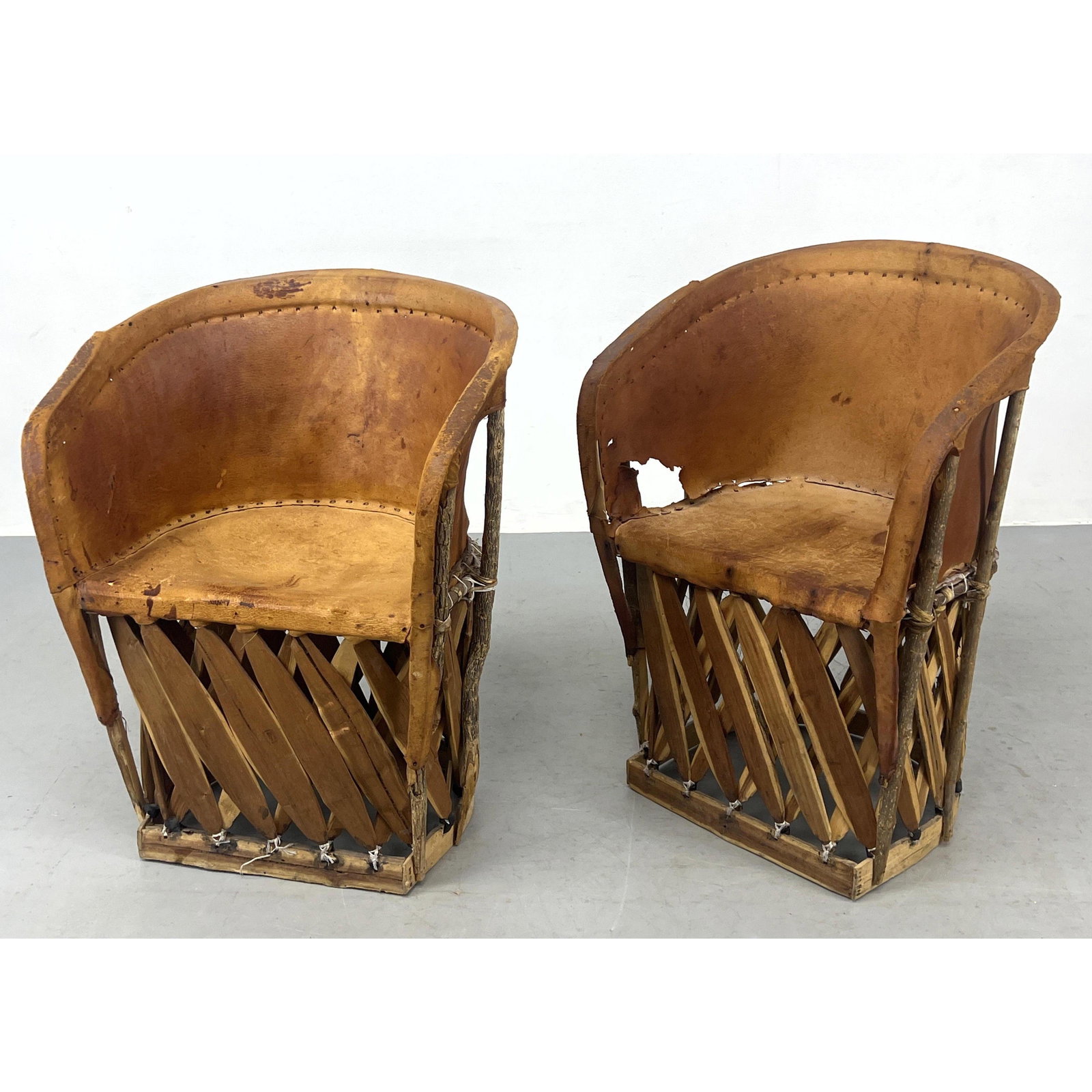 Pr Mexican Leather Lounge Chairs.: Pr Mexican Leather Lounge Chairs. Dimensions: H: 32 inches: W: 23.5 inches: D: 20 inches - Seat Height: 17 inches --- Delivery Offer: Uniques offers curbside delivery to NYC, Manhattan, Close Brooklyn