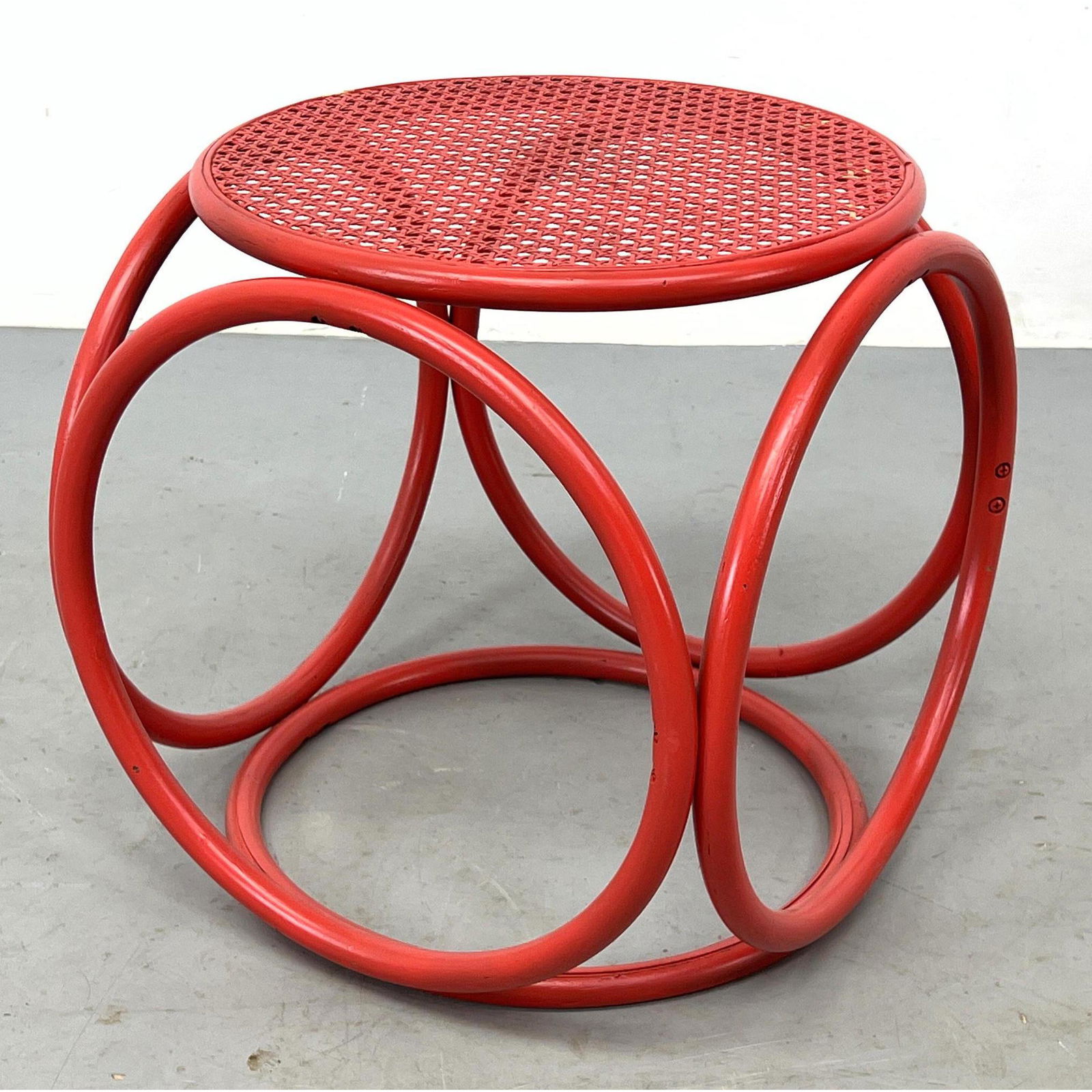 Red Thonet style caned ottoman stool. (1 of 6)