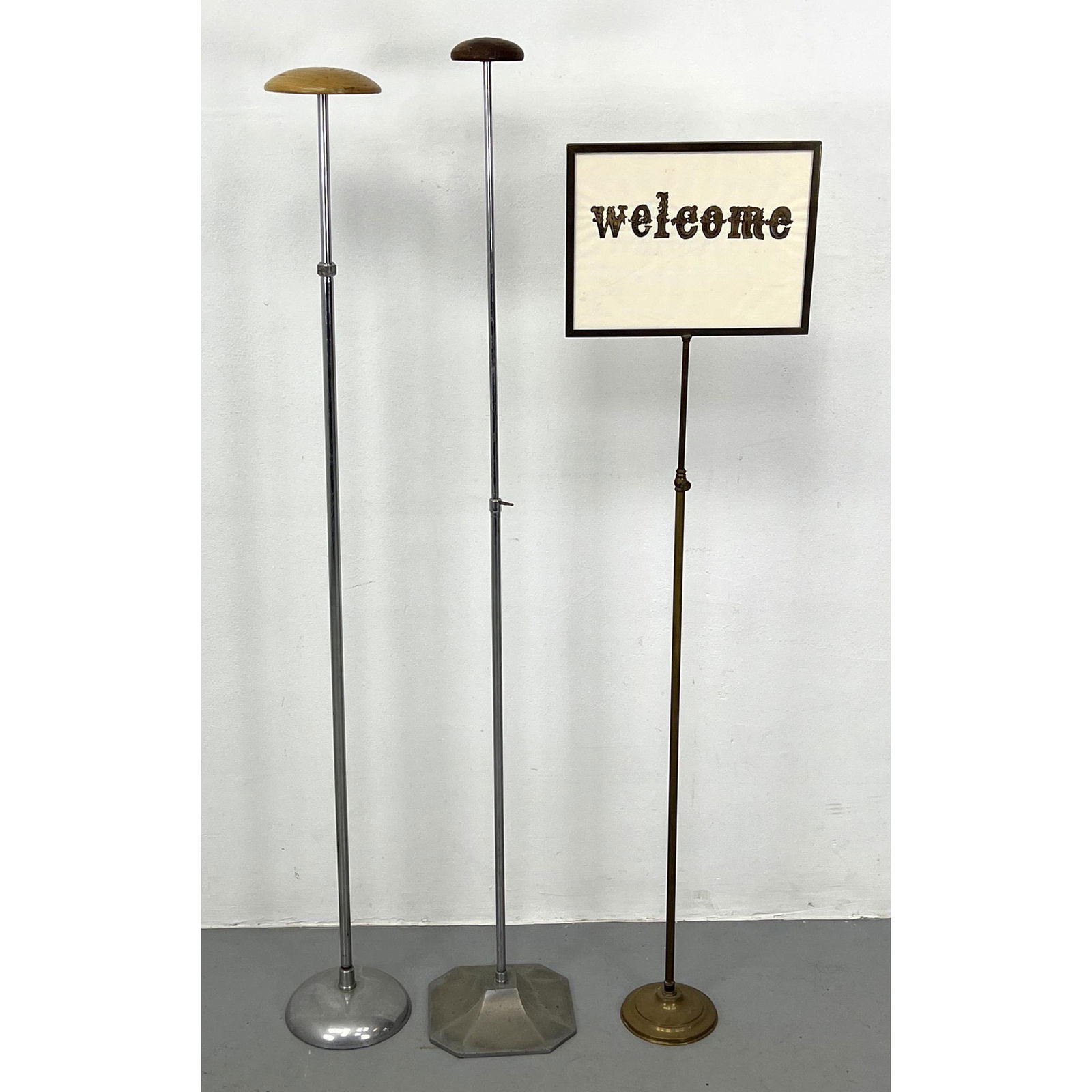 Lot Tall Metal Poles. One sign holder. Two are presumably hat racks??? (1 of 10)