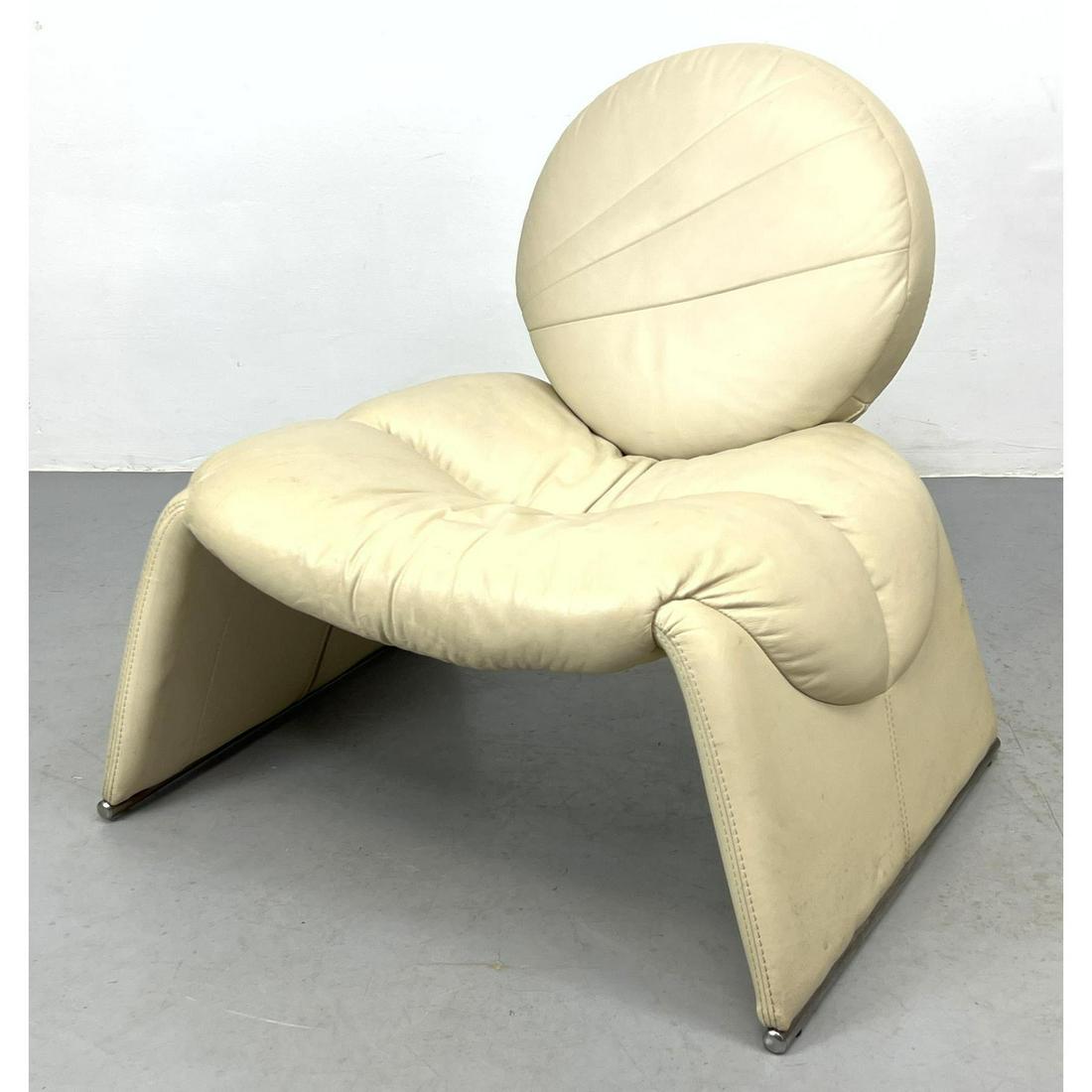 2002 Italian Calipso Leather Lounge Chair. Cream Leather Chair with Marshmallow form back. Chrome fo: 2002 Italian Calipso Leather Lounge Chair. Cream Leather Chair with Marshmallow form back. Chrome foot runners. Labels. Dimensions: H: 30 inches: W: 32 inches: D: 29 inches - Seat Height: 17 inches --