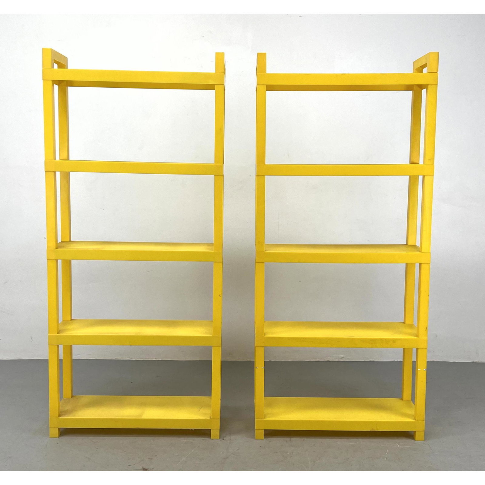 Pair Yellow Plastic modular stacking shelves: Pair Yellow Plastic modular stacking shelves Dimensions: H: 67 inches: W: 30 inches: D: 11 inches ---