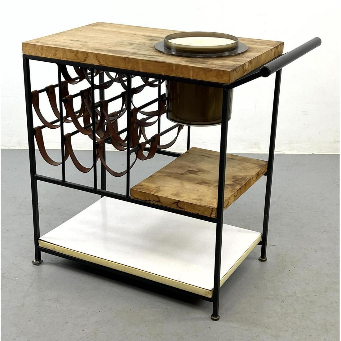 ARTHUR UMANOFF Modernist Iron Bar Cart. Serving Cart. Butcher Block Top. Leather strap wine rack. FE: ARTHUR UMANOFF Modernist Iron Bar Cart. Serving Cart. Butcher Block Top. Leather strap wine rack. FESCO Lucite Ice Bucket. Dimensions: H: 28 inches: W: 28 inches: D: 16 inches ---