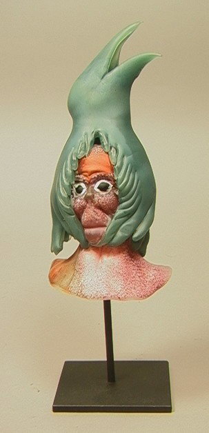 JOHN CHIN Signed Art Glass Sculpture on Iron Stra: JOHN CHIN Signed Art Glass Sculpture on Iron Stand. Head with Spiky Hair. Signed.-- Dimensions: H: 9.25 inches: W: 4 inches US Shipping charge: $28