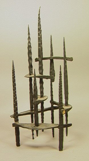 Heavy Iron DAVID PALUMBO Brutalist Sculptural Men: Heavy Iron DAVID PALUMBO Brutalist Sculptural Menorah. Brutalist Spiked Design. David Palumbo is an Israeli Artist Sculptor. Unmarked. -- Dimensions: H: 21 inches: W: 9.5 inches: D: 9.5 inches US Ship