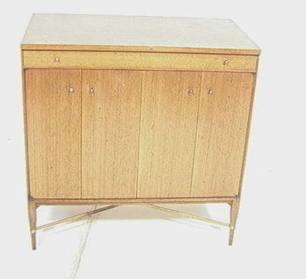 PAUL McCOBB Server. American Modern Walnut Server: PAUL McCOBB Server. American Modern Walnut Server. CALVIN Collection. Nice Brass "X" Stretcher. Brass Pulls. Marked w/ Metal tag.-- Dimensions: H: 36 inches: W: 36 inches: D: 19.25 inches ---
