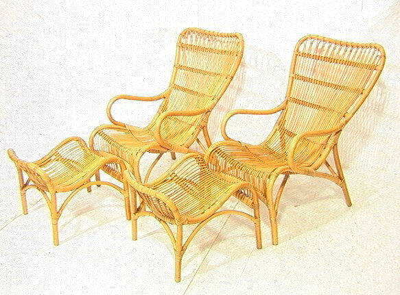 Pr Rattan Lounge Chairs and Stools. Tall fan back: Pr Rattan Lounge Chairs and Stools. Tall fan back chairs. Bowed arms. Sloped form ottomans. 4 PCS-- Dimensions: H: 36 inches: W: 24 inches: D: 36 inches ---