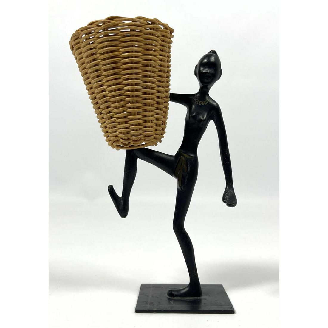Hagenauer Style match holder. Figure with basket.: Hagenauer Style match holder. Figure with basket. Dimensions: H: 6 inches: W: 3 inches: D: 2 inches --- US Shipping charge: $20 Plus insurance at a rate of $1 per hundred.
