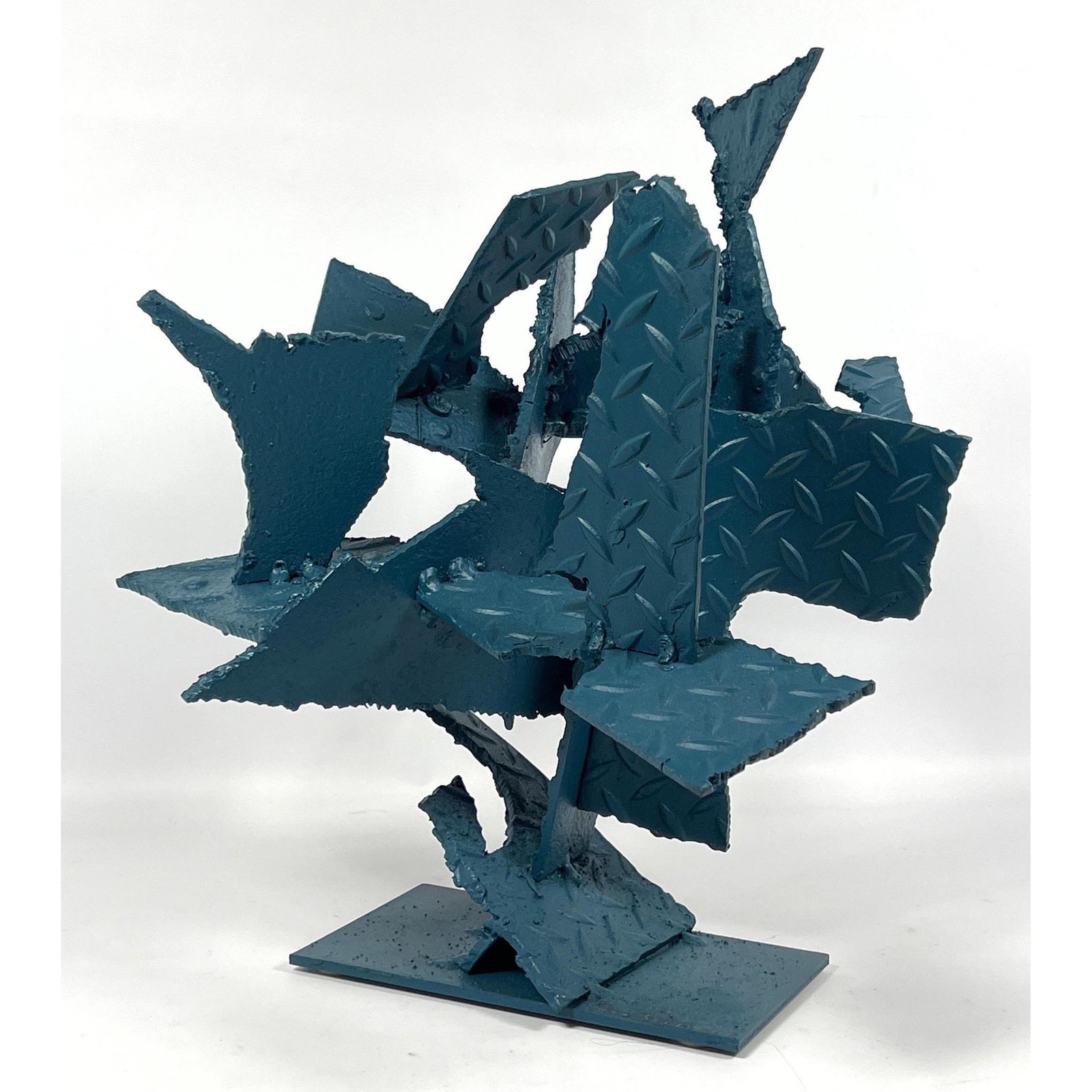 Joe Seltzer, welded found steel objects, Welded cut diamond plate design. Signed: Joe Seltzer, welded found "Smooth and Cross-hatched" steel objects, Welded cut diamond plate design. Signed Dimensions: H: 19.5 inches: W: 16 inches: D: 17 inches --- We offer curbside delivery to NYC