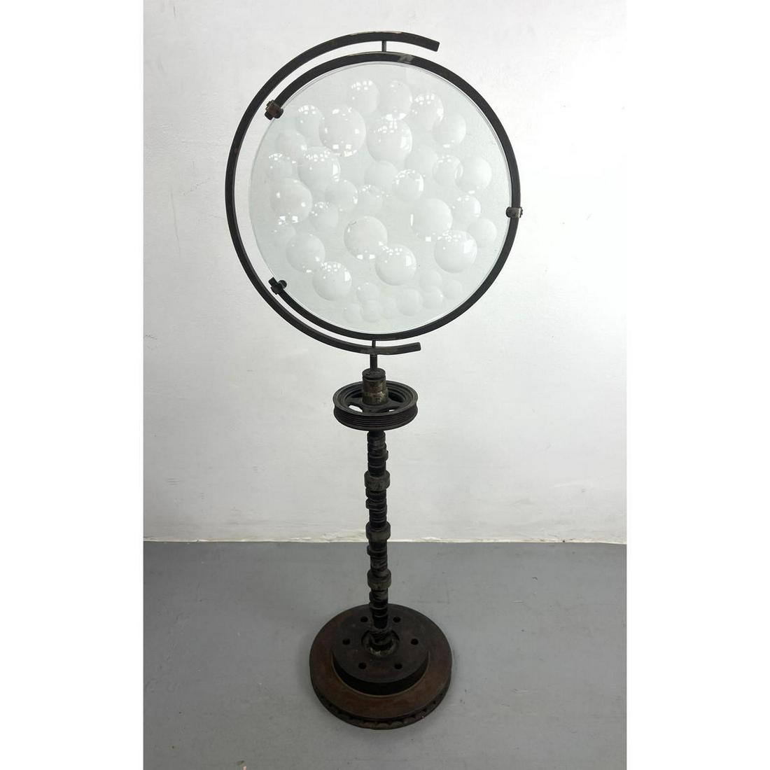 Movable Industrial Magiscope Floor Sculpture. Cam Shaft Base. Glass panel can swivel in frame.: Movable Industrial Magiscope Floor Sculpture. Cam Shaft Base. Glass panel can swivel in frame. Dimensions: H: 47 inches: W: 17.5 inches: D: 12 inches ---