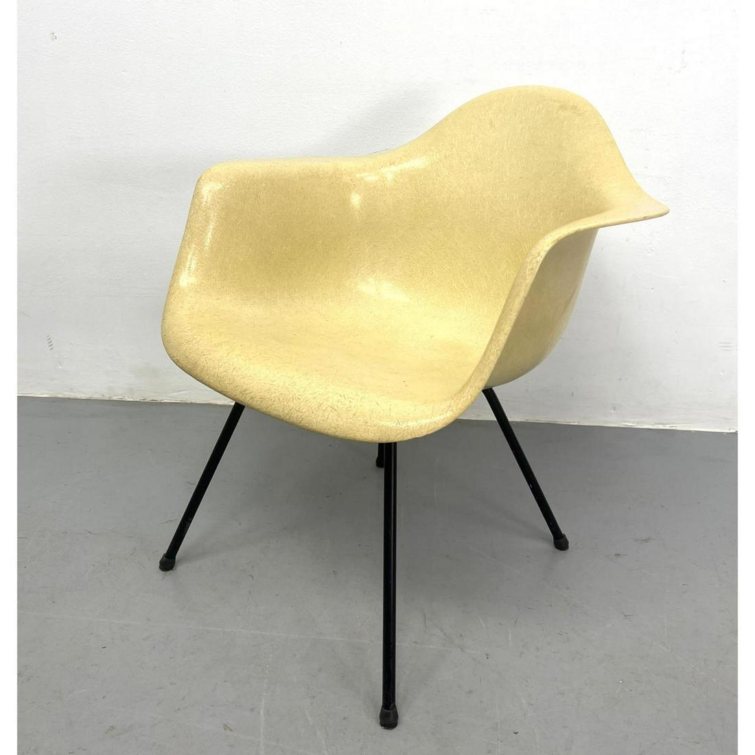 Charles Eames Herman Miller Fiberglass Arm Chair.: Charles Eames Herman Miller Fiberglass Arm Chair. Dimensions: H: 27.5 inches: W: 25 inches: D: 27 inches - Seat Height: 16 inches ---