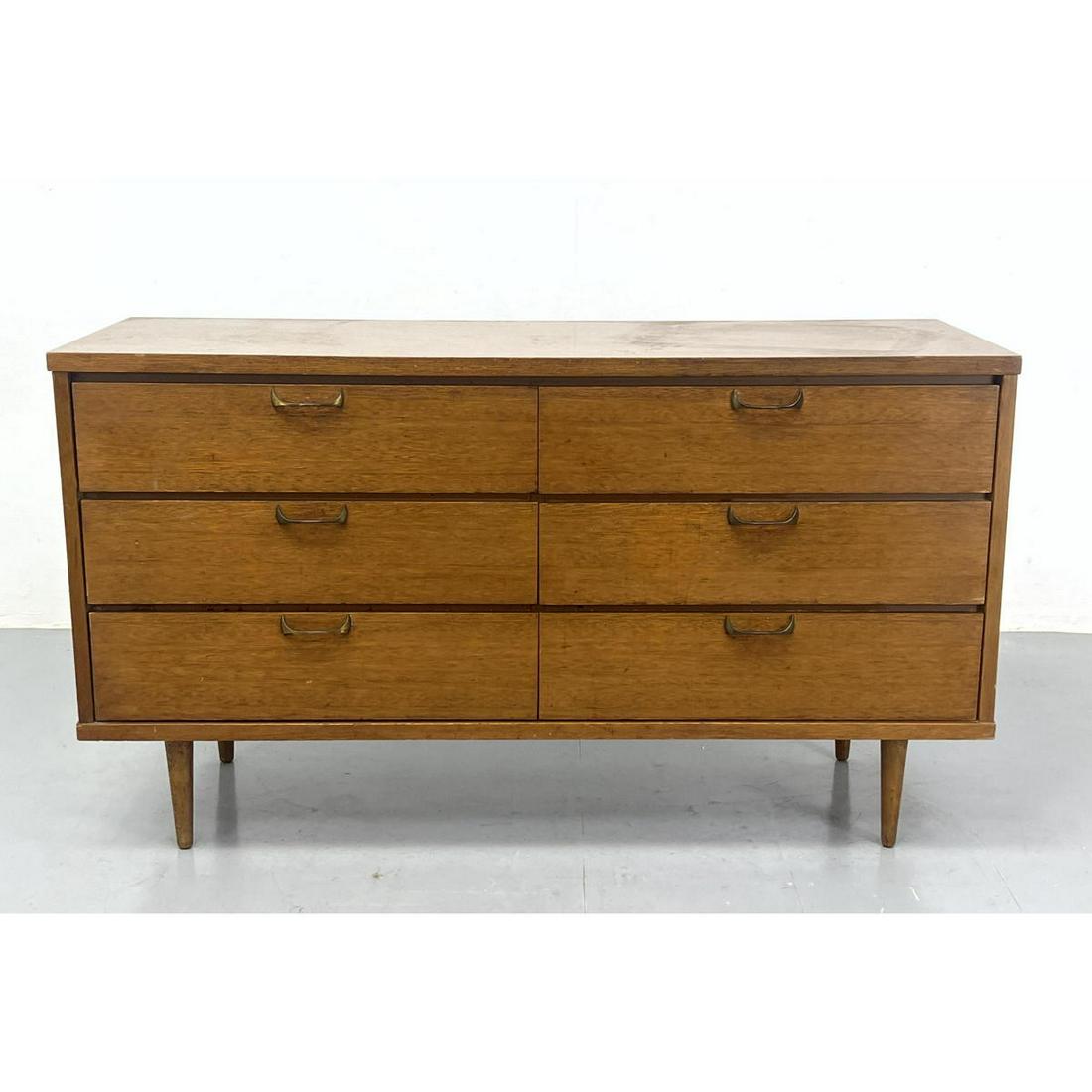 American Modern Walnut Credenza Dresser. Rests on Four Tapered Peg Legs. Metal Modernist Pulls.: American Modern Walnut Credenza Dresser. Rests on Four Tapered Peg Legs. Metal Modernist Pulls. Dimensions: H: 30 inches: W: 52 inches: D: 17.75 inches --- We offer curbside delivery to NYC, Manhattan