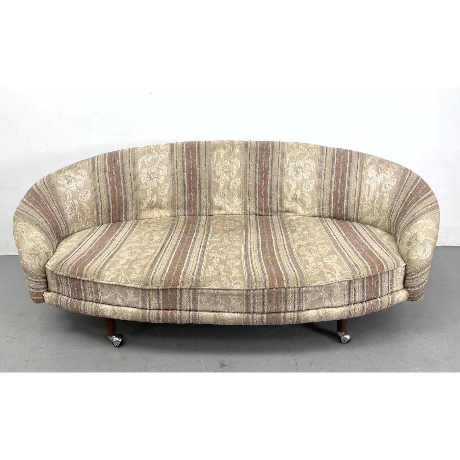 Modernist Curved Form Sofa Couch. Hidden metal frame with walnut peg leg on casters. Striped upholst (1 of 8)