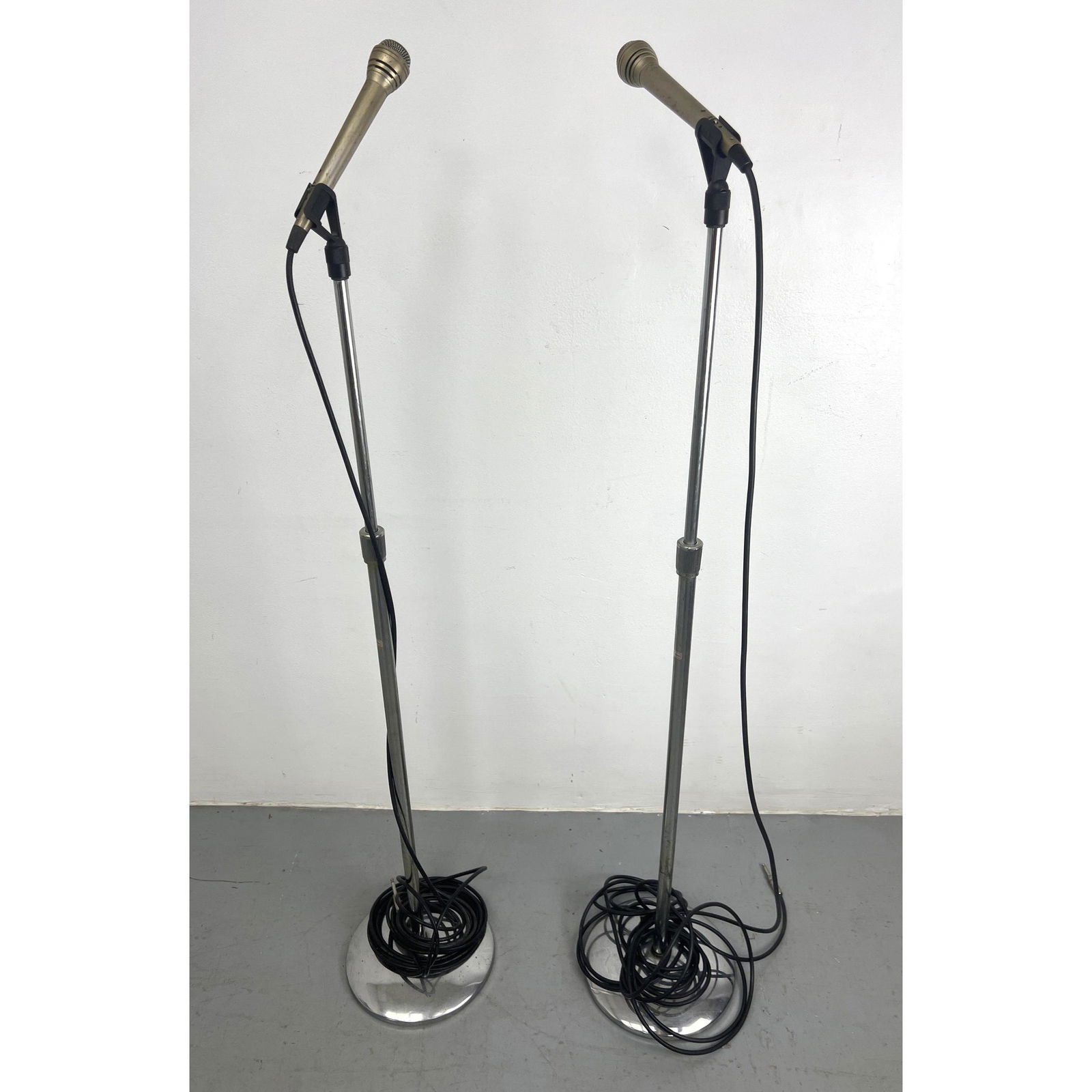 Pr Akg D125 Microphones. On Chrome Stands.