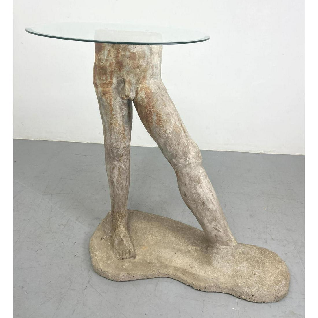 Male Nude Torso Base Glass Top Table. Rough Hewn Figural Form supports round glass top.: Male Nude Torso Base Glass Top Table. Rough Hewn Figural Form supports round glass top. Dimensions: H: 40 inches: W: 36 inches: D: 16.5 inches --- We offer curbside delivery to NYC, Manhattan, Close B
