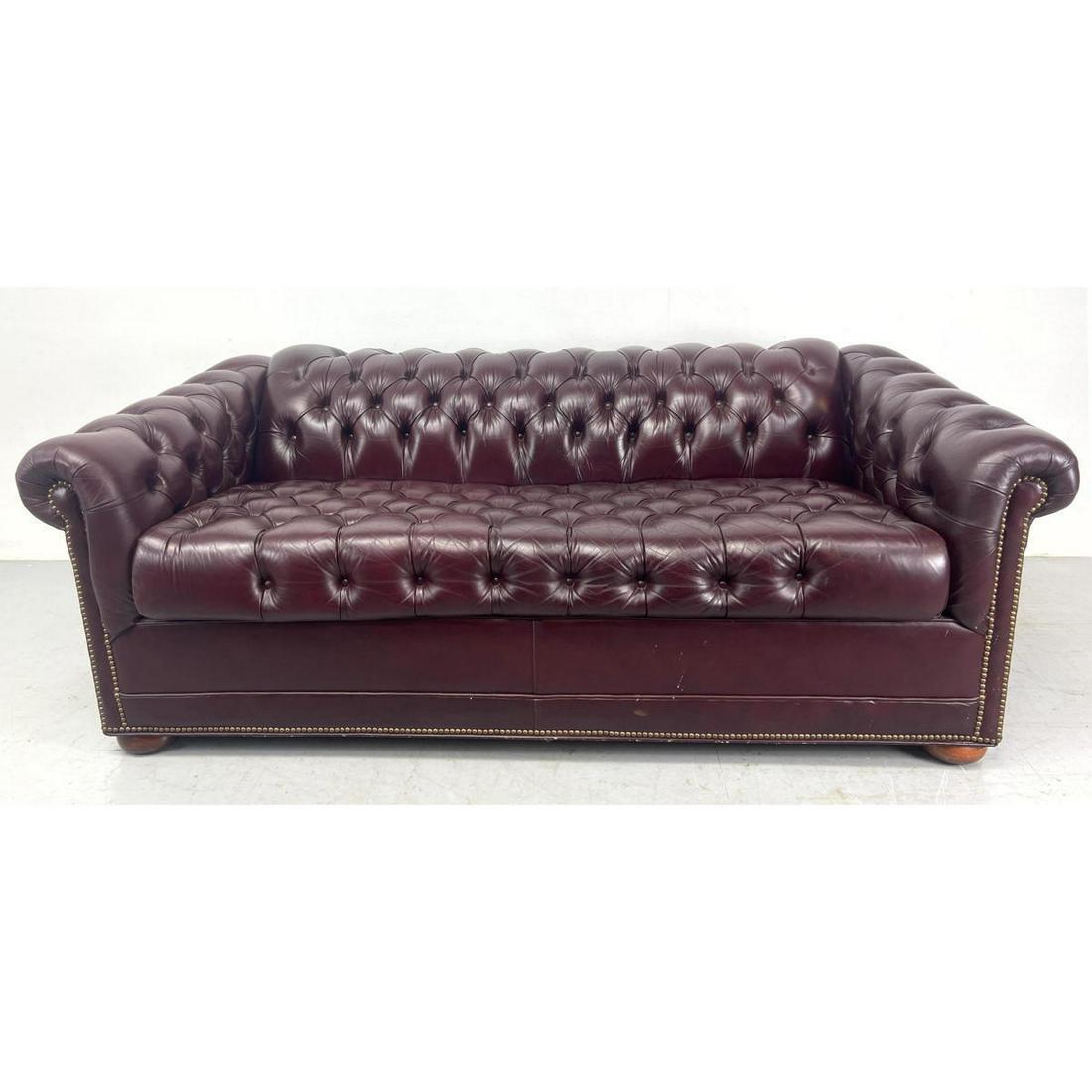 Burgundy leather Chesterfield Sleeper Sofa. Tufted Upholstery with brass tack trim. DEEP SLEEPER Mat (1 of 12)