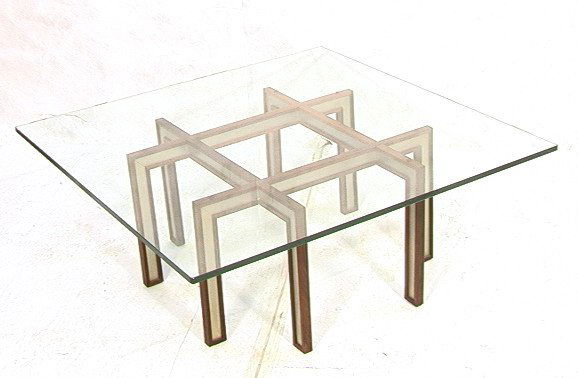 HENNING KORCH Rosewood Aluminum Cocktail Table. H: HENNING KORCH Rosewood Aluminum Cocktail Table. HENNING KORCH for C.F. Christensen Silkeborg Denmark. .50" Thick glass top on grid Pattern Rosewood & aluminum legs. Unmarked. -- Dimensions: H: 16 inch