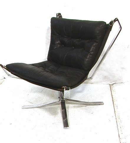Chrome Sling FALCON Chair by SIGURD RESSELL. Heav: Chrome Sling FALCON Chair by SIGURD RESSELL. Heavy Chromed Steel Frame with Black Leather Sling Cushion. Leather buckle straps. Unmarked.-- Dimensions: H: 32.5 inches: W: 31 inches: D: 31 inches ---