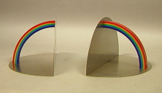 Pr LUCIO DEL PEZZO Ltd. Ed. Rainbow Sculpture. Ra: Pr LUCIO DEL PEZZO Ltd. Ed. Rainbow Sculpture. Rainbow Plexiglas and Chrome. Plexiglass e Acciaio Inox. Signed & Numbered 256/500 and 360/500. 2 PCS.-- Dimensions: H: 6.5 inches: W: 13 inches: D: 6.5