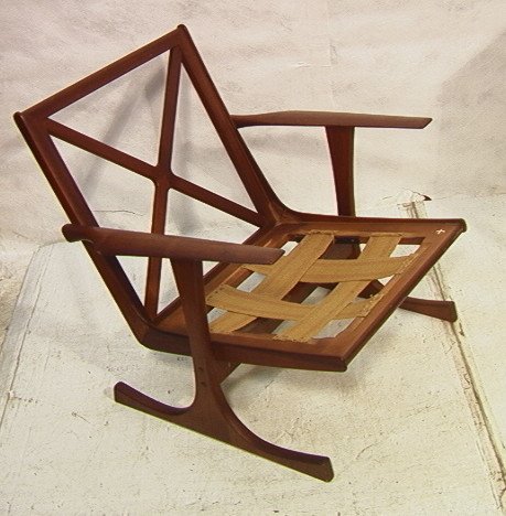 SELIG Teak Wide Arm Lounge Chair. "T" Base. Nice: SELIG Teak Wide Arm Lounge Chair. "T" Base. Nice form teak frame. -- Dimensions: H: 29.5 inches: W: 31 inches: D: 32 inches ---