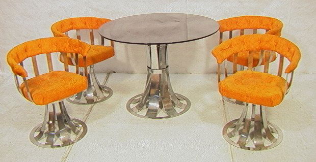 5 PCS WOODARD Style Dining Set. Table & 4 Pedesta: 5 PCS WOODARD Style Dining Set. Table & 4 Pedestal Base Chairs. Smoked Glass Top Table. Orange seat & back. Chairs swivel.-- Dimensions: H: 29 inches: W: 42 inches: D: 42 inches ---