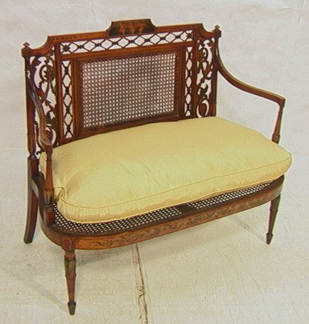 Adams Edwardian Paint decorated Love seat Settee.: Adams Edwardian Paint decorated Love seat Settee. Cherub painted crest rail. Open carved sides. -- Dimensions: H: 37 inches: D: 22 inches: L: 45 inches ---