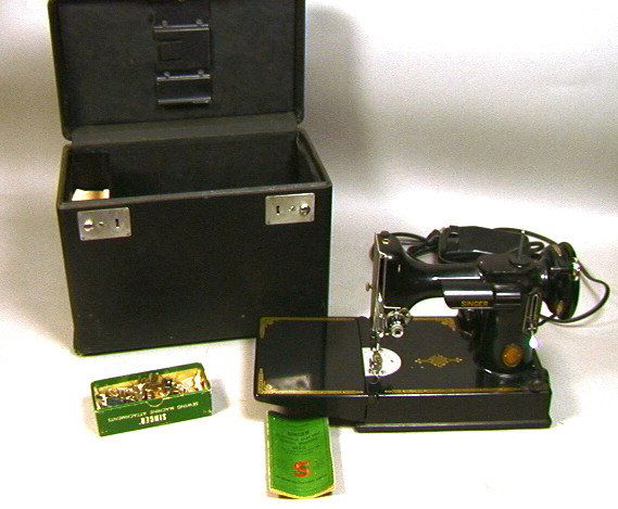 SINGER FeatherWeight Sewing Machine. Model 221-1: SINGER FeatherWeight Sewing Machine. Model 221-1 BLACK Sewing Machine in Black Case.-- Dimensions: H: 9.5 inches: W: 15.5 inches: D: 7 inches --- US Shipping charge: $50