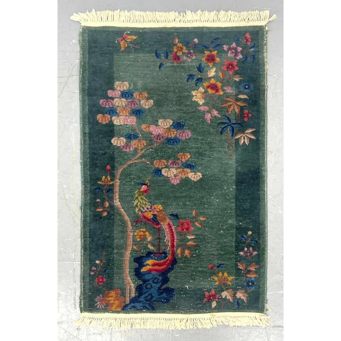 3'1" x 5'2" Nichols Oriental rug. Bird, butterflies and flowers on green ground. (1 of 10)