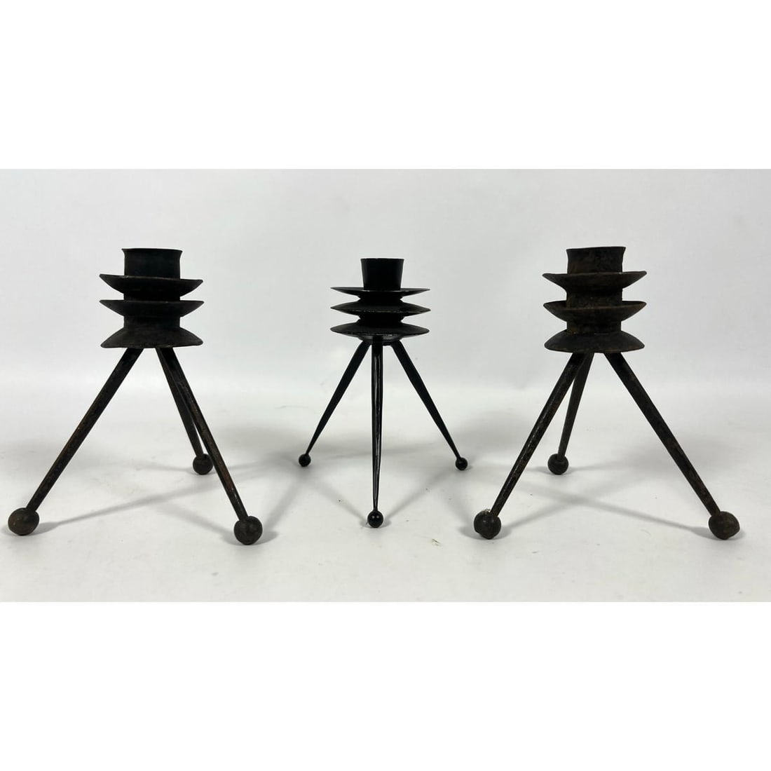Trio of TONY PAUL Black Iron Candlesticks. Tripod Leg Bases support Tiered Holders. (1 of 11)