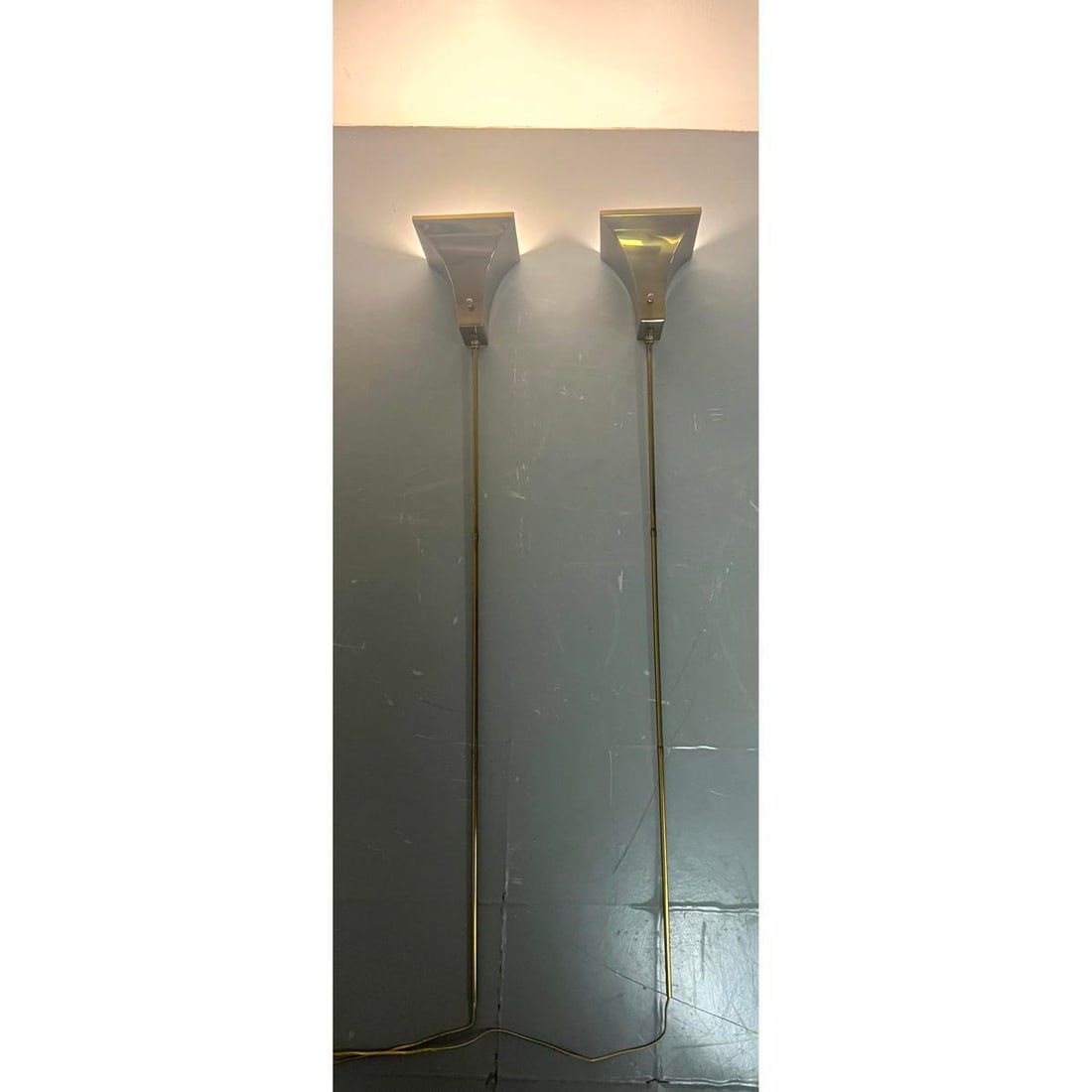 Pr Brass Wall Mounted Light Sconces. Each has long brass tube to conceal cord. Flared brass shades. (1 of 13)