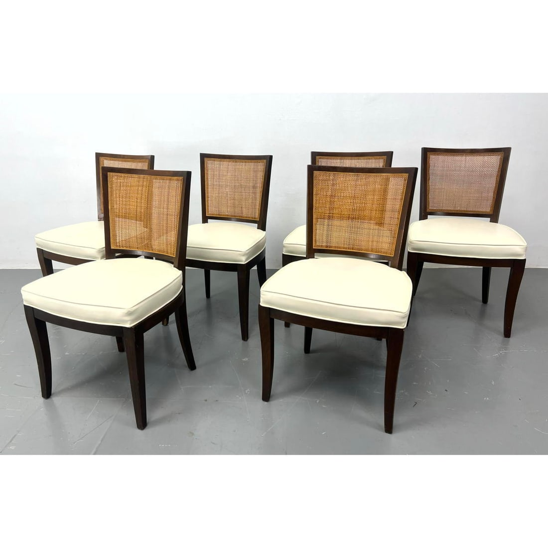 Set of 6 Bert England for Johnson furniture company walnut and Cane dining chairs. Upholstered seats: Set of 6 Bert England for Johnson furniture company walnut and Cane dining chairs. Upholstered seats. Dimensions: H: 33 inches: W: 19 inches: D: 17 inches - Seat Height: 18 inches ---