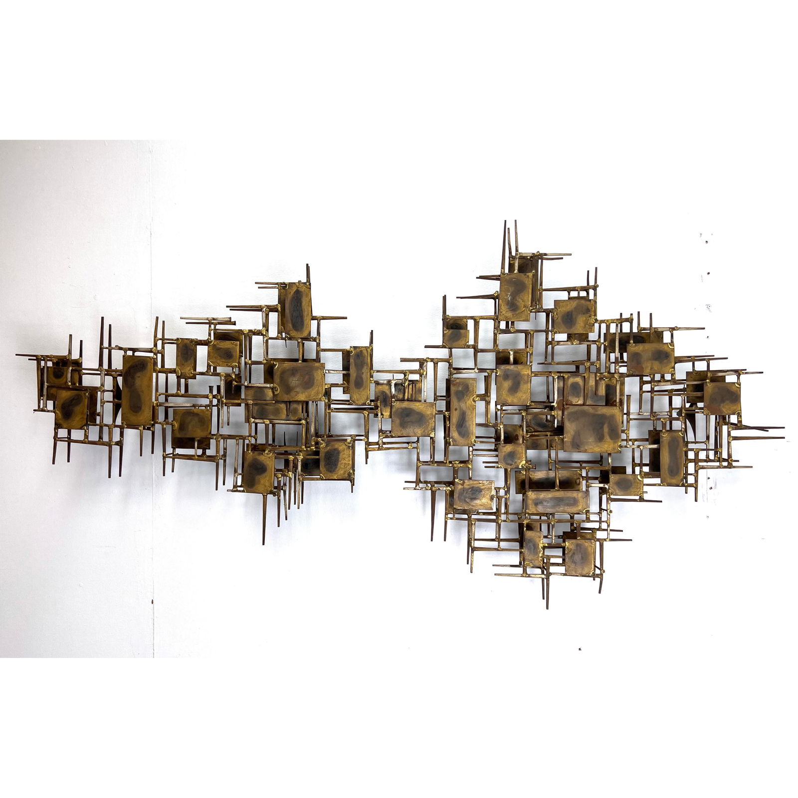 MARC CREATES Brutalist Metal Wall Sculpture. Welded square nails and brass panels. Label.: MARC CREATES Brutalist Metal Wall Sculpture. Welded square nails and brass panels. Label. H: 30.5 inches: W: 60 inches: D: 5 inches ---