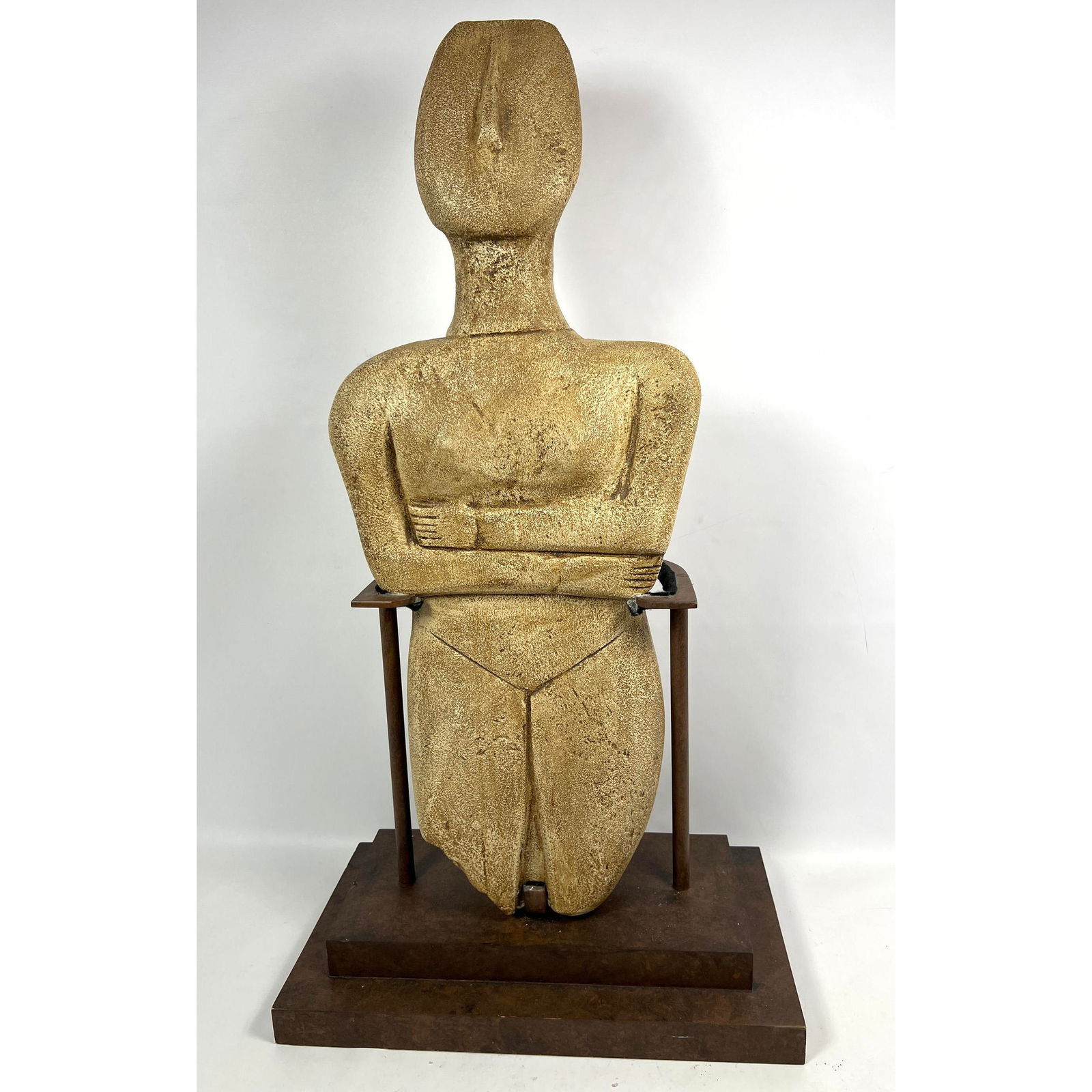 Figural Plaster Tribal Sculpture. Figural. Metal and wood base. (1 of 12)