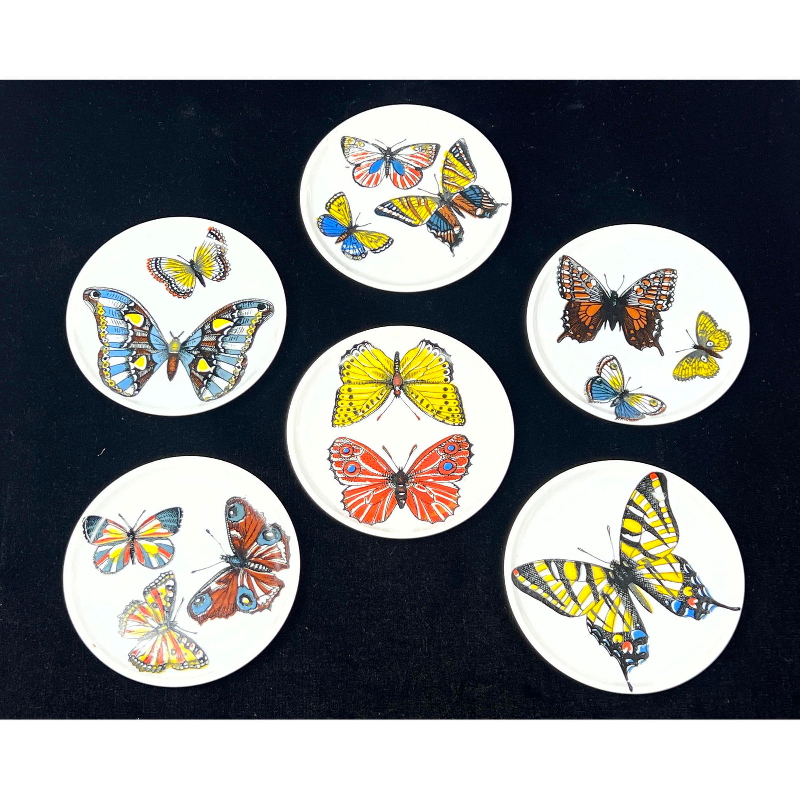Set 6 PIERO FORNASETTI Butterfly Coasters. Graphic images in Primary Colors. Italian Mid Century Mod: Set 6 PIERO FORNASETTI Butterfly Coasters. Graphic images in Primary Colors. Italian Mid Century Modern Design. Marked. H: 4 inches: W: 4 inches --- US Packing and Shipping charge: $35 Plus insurance