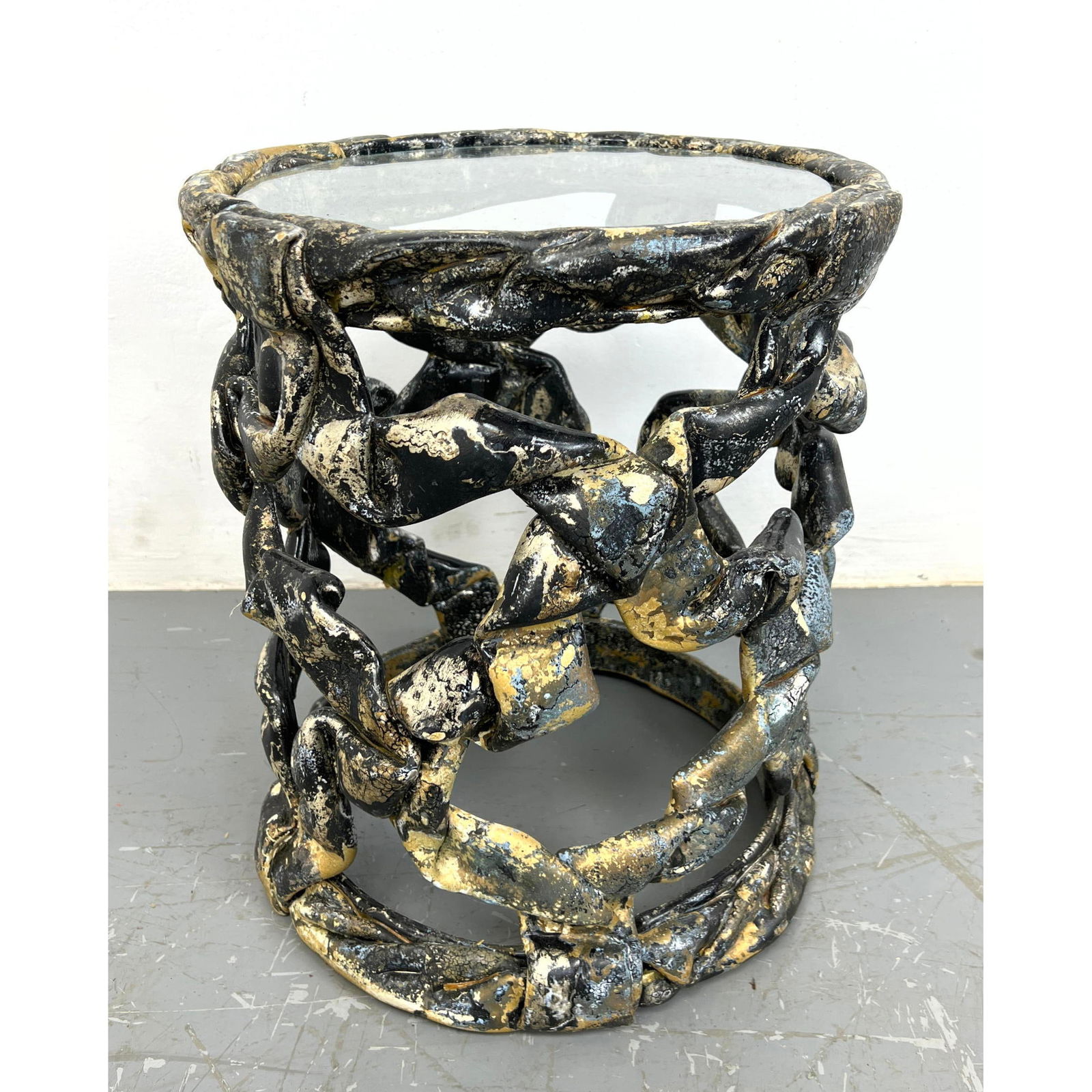 TONY DUQUETTE style Taffy Side Table. Mottled black and gold ribbon form frame. Glass top. (1 of 7)