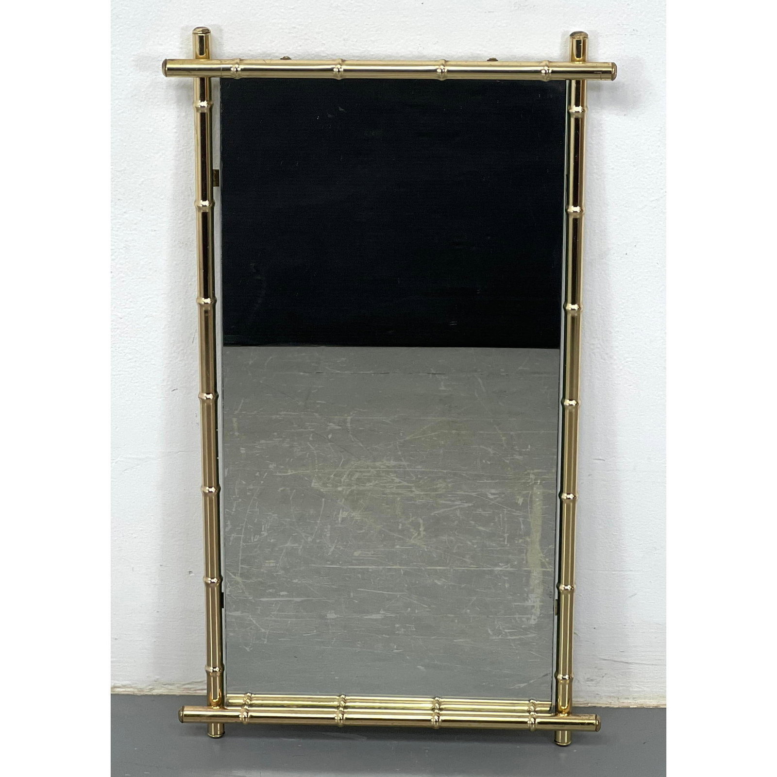 Faux Bamboo Brass Finish Wall Mirror: Faux Bamboo Brass Finish Wall Mirror H: 26 inches: W: 15.25 inches ---