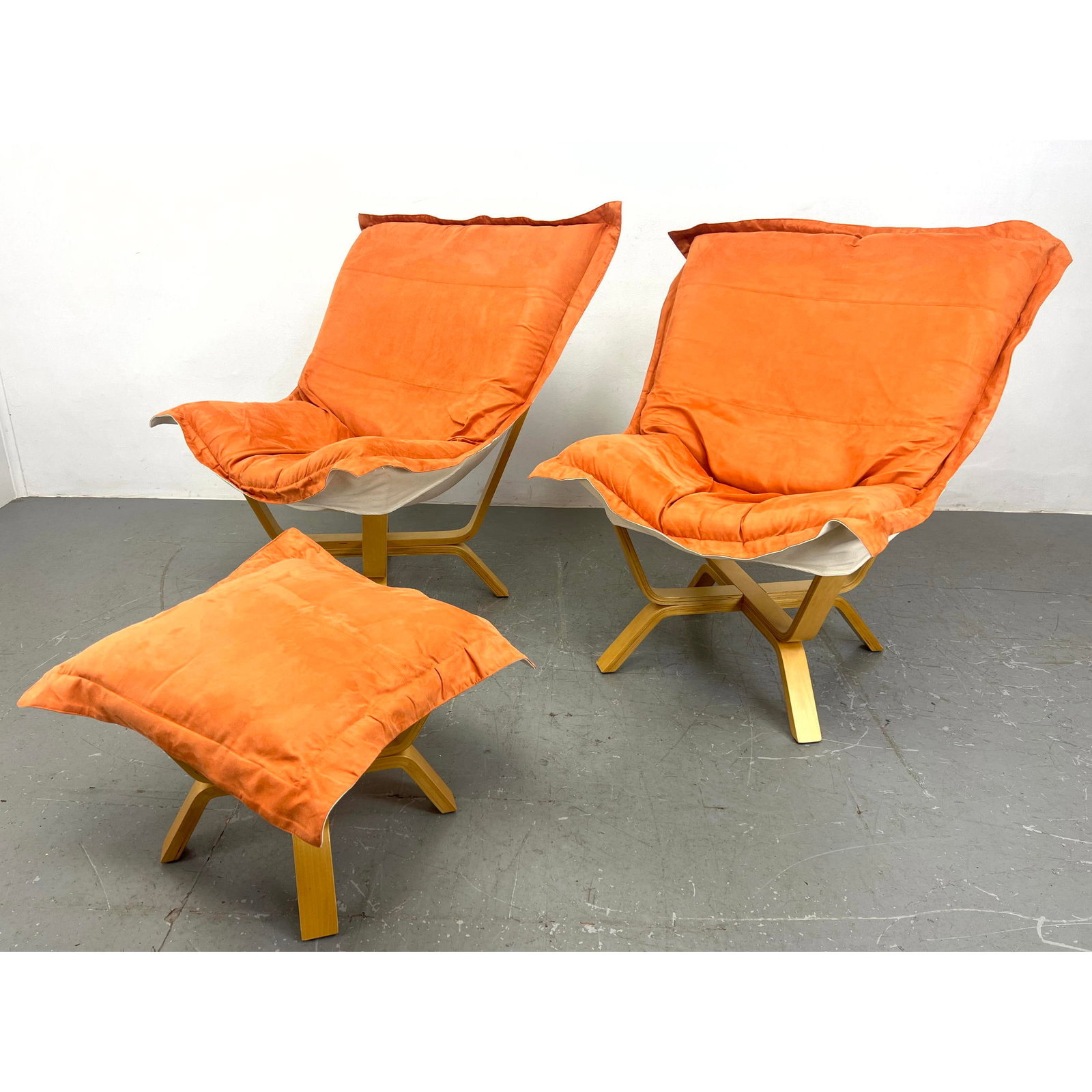 3pc Laminated Wood Frame Lounge Chairs, Ottoman. Pr Blond wood frame Chairs with orange cushion slip: 3pc Laminated Wood Frame Lounge Chairs, Ottoman. Pr Blond wood frame Chairs with orange cushion slipcover. Single matching ottoman. Dimensions: H: 41 inches: W: 40 inches: D: 36 inches - Seat Height: 