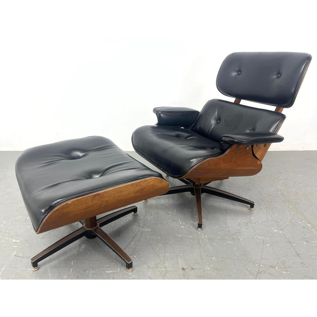 SELIG Mid Century Modern Lounge Chair, Ottoman. Black Vinyl Cushions on Bentwood Frame.: SELIG Mid Century Modern Lounge Chair, Ottoman. Black Vinyl Cushions on Bentwood Frame. Dimensions: H: 35 inches: W: 32 inches: D: 32 inches - Seat Height: 17.5 inches ---