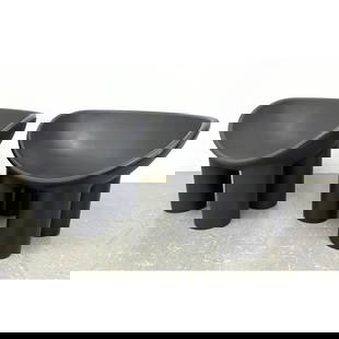 Pr Roly Poly Molded Plastic Lounge Chairs. Black seat with four thick column legs. Faye Toogood Roly: Pr Roly Poly Molded Plastic Lounge Chairs. Black seat with four thick column legs. Faye Toogood Roly Unmarked. Dimensions: H: 24 inches: W: 33 inches: D: 22 inches - Seat Height: 15 inches ---