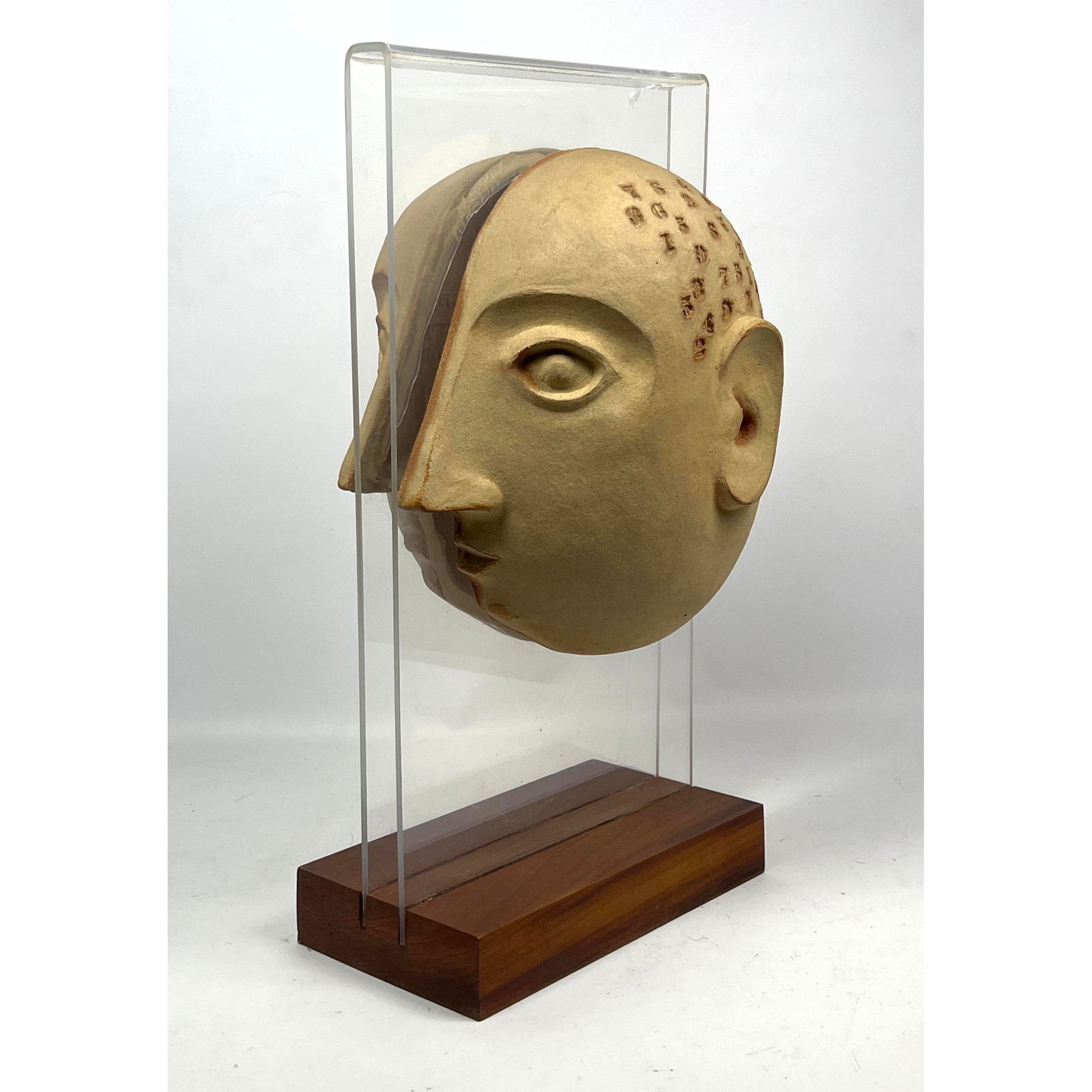 Mid Century DAVID GIL Pottery Face Sculpture. For BENNINGTON Potters. Two Profile Heads with impres: Mid Century DAVID GIL Pottery Face Sculpture. For BENNINGTON Potters. Two Profile Heads with impressed numbers. Mounted on Lucite with Walnut Base. Dimensions: H: 19.5 inches: W: 10 inches: D: 9 inche